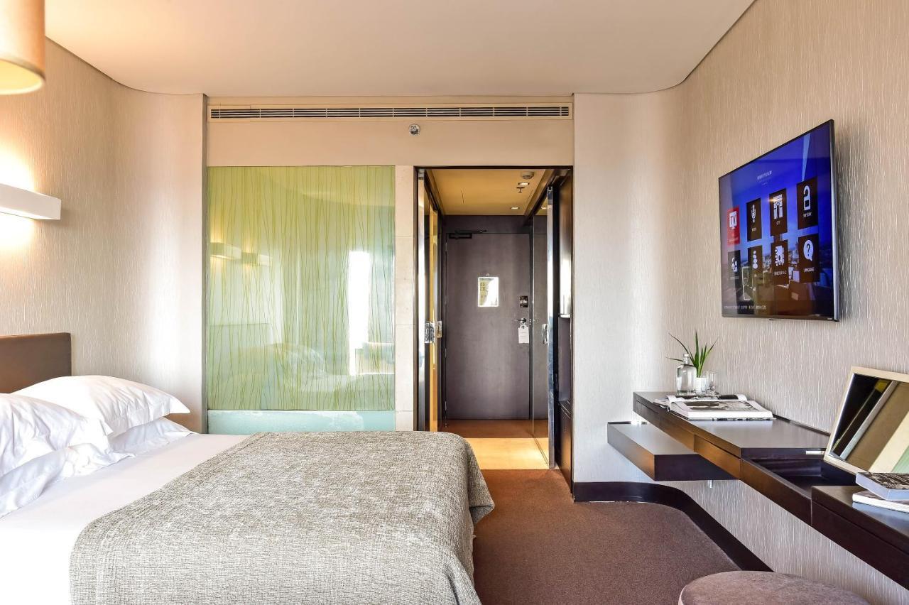 Porto Palacio Hotel By The Editory Luaran gambar A room at the hotel